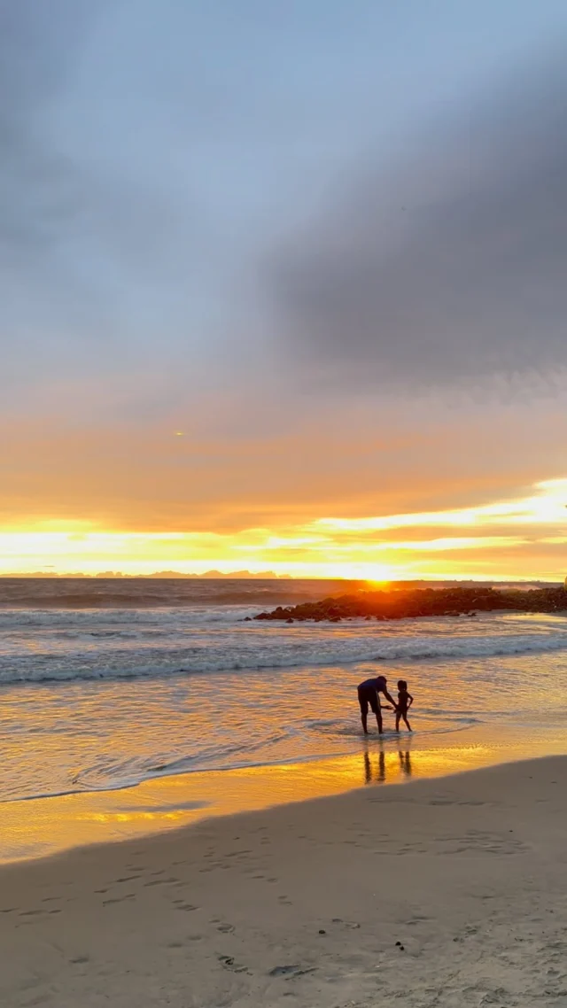 Golden hour on a beach near Kochi, with the sun setting over the sea